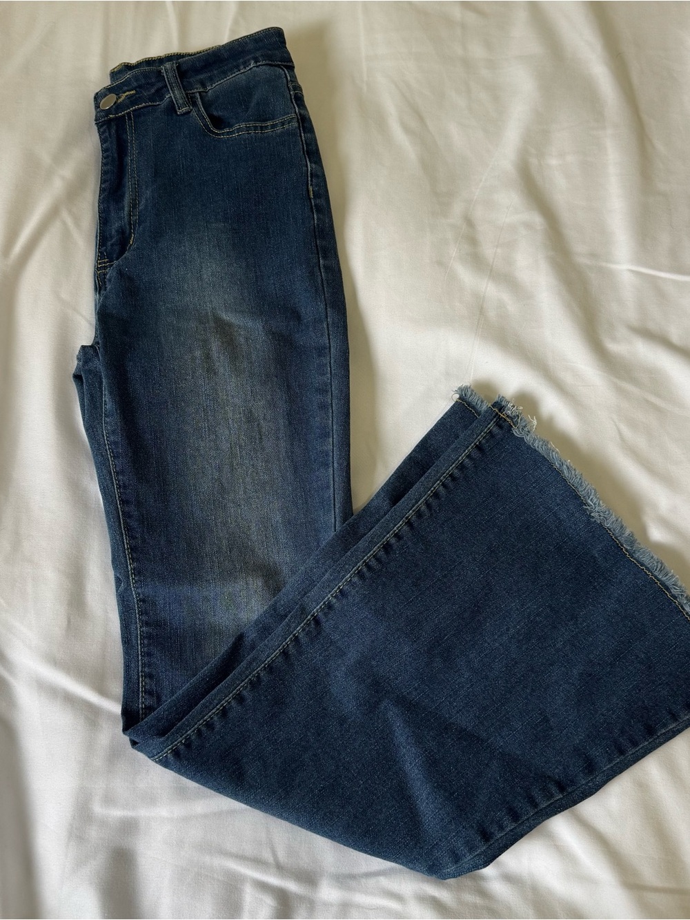 Flared Jeans with Frayed Hem